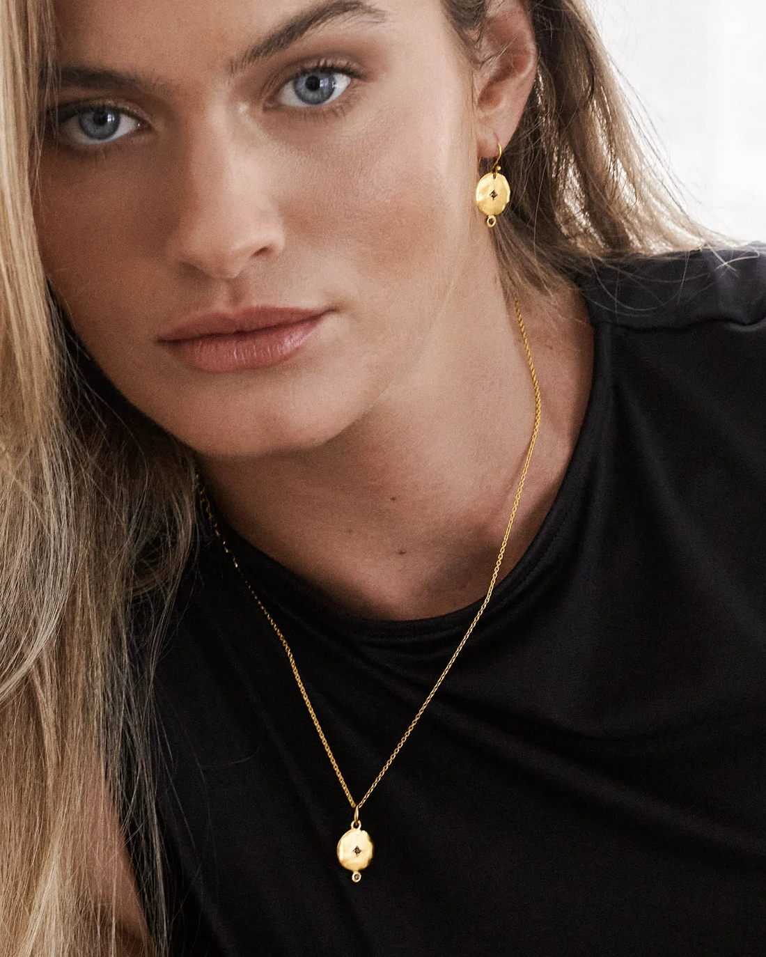 Goddess Blue Sapphire Earring shown in gold and silver
